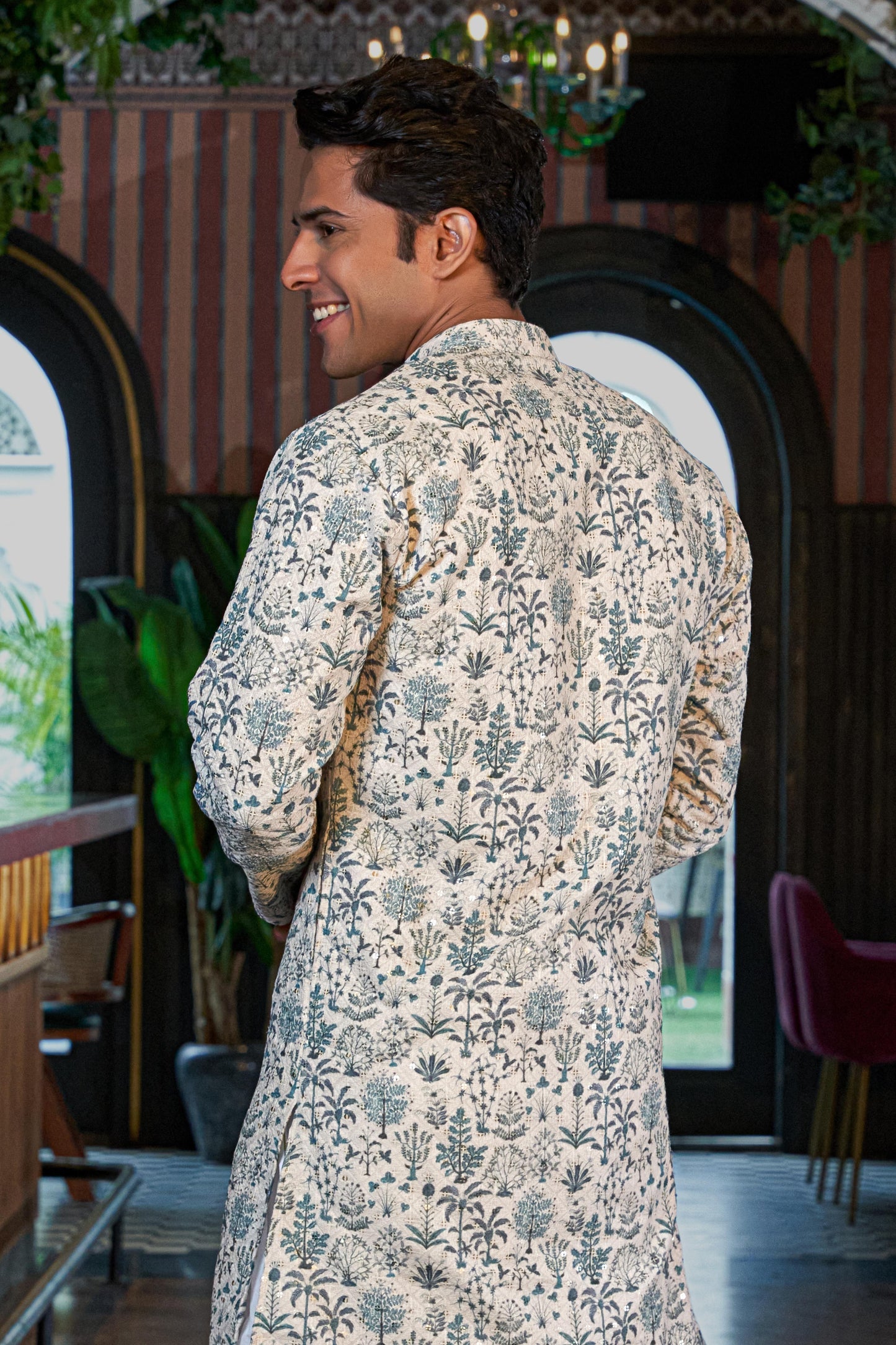 The Pearl White Embroidery Work Long Kurta with Green Botanical Print and Sequins Work