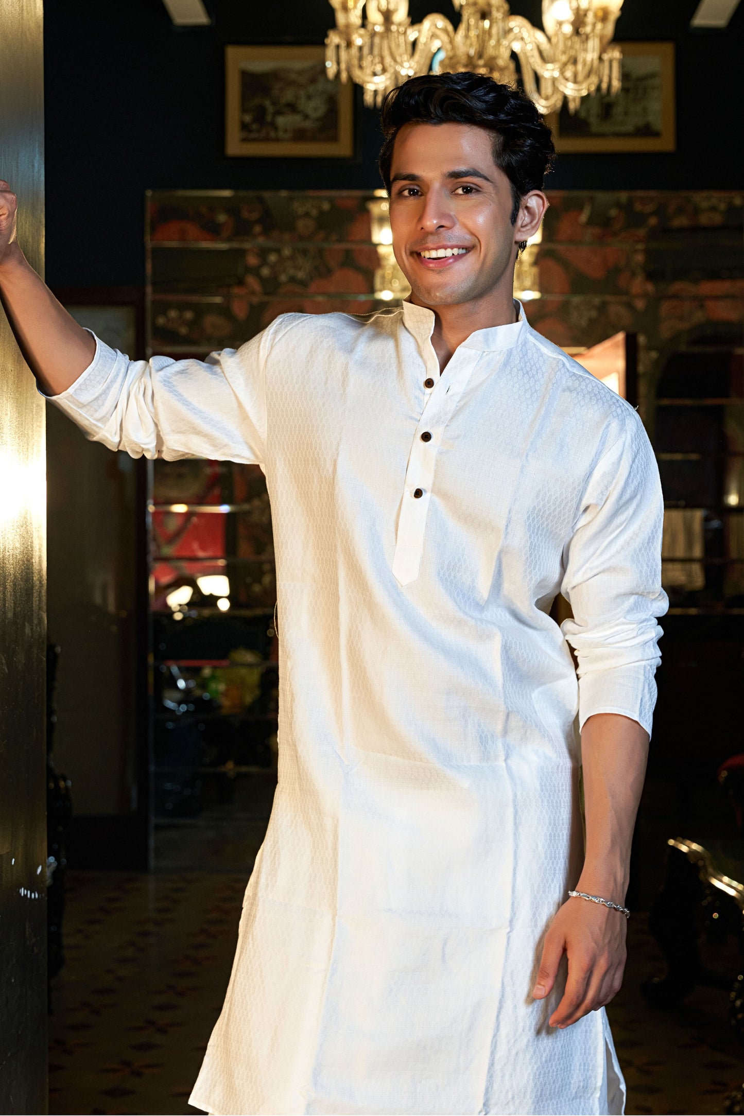 The White Long Kurta With Self Butti Work