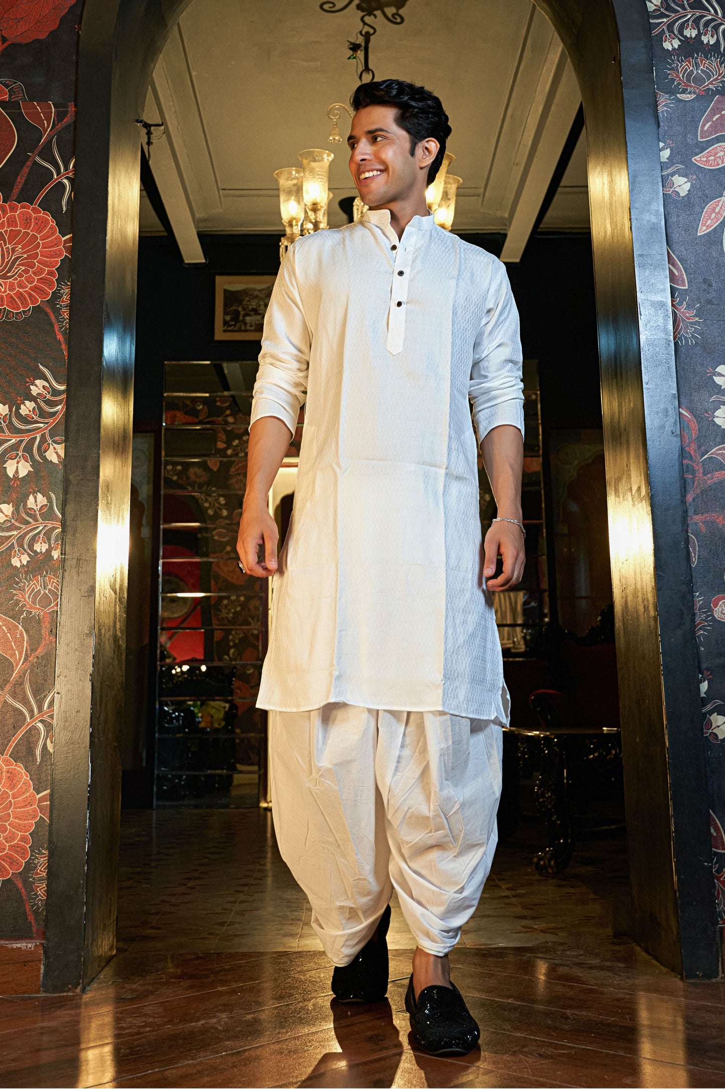 The White Long Kurta With Self Butti Work