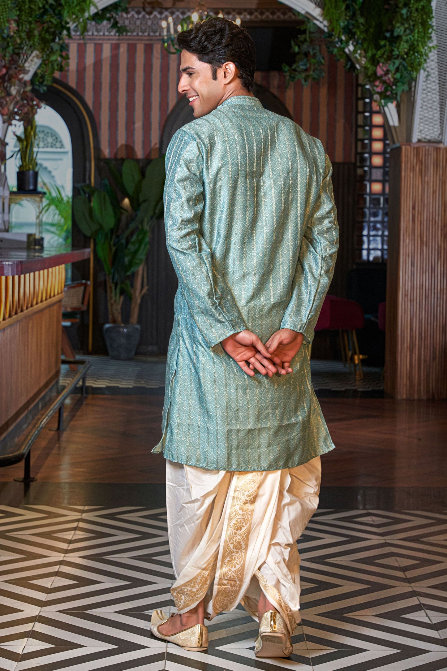 The Tiffany Blue Color Long Kurta with Golden Zari Stripe and Floral Print