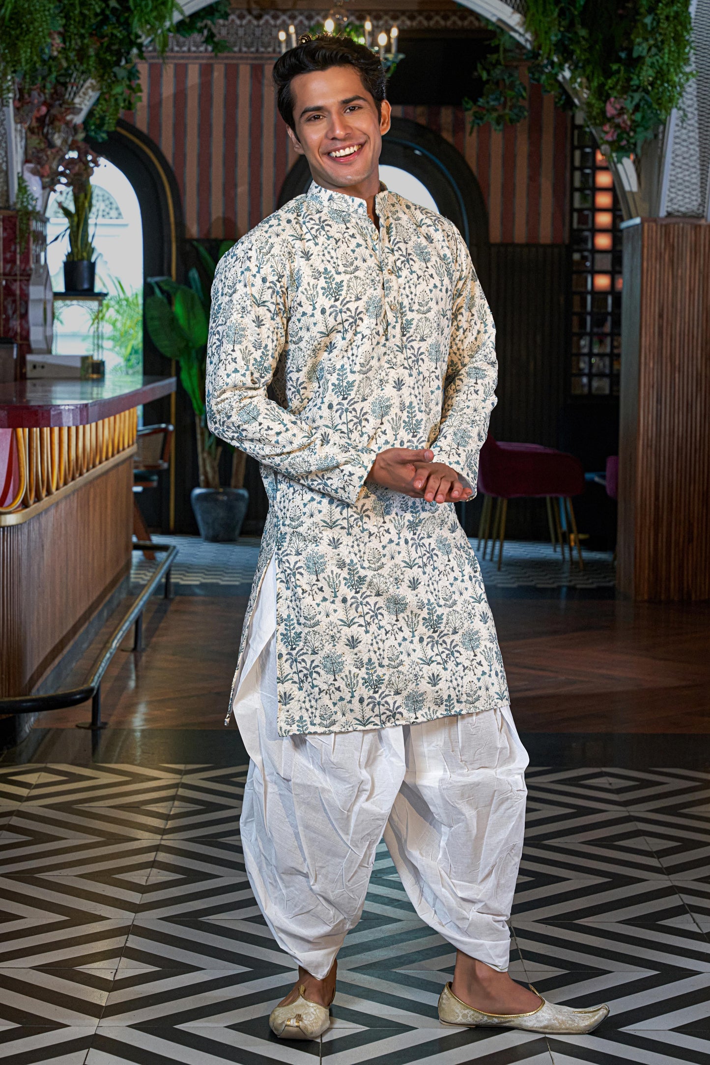 The Pearl White Embroidery Work Long Kurta with Green Botanical Print and Sequins Work