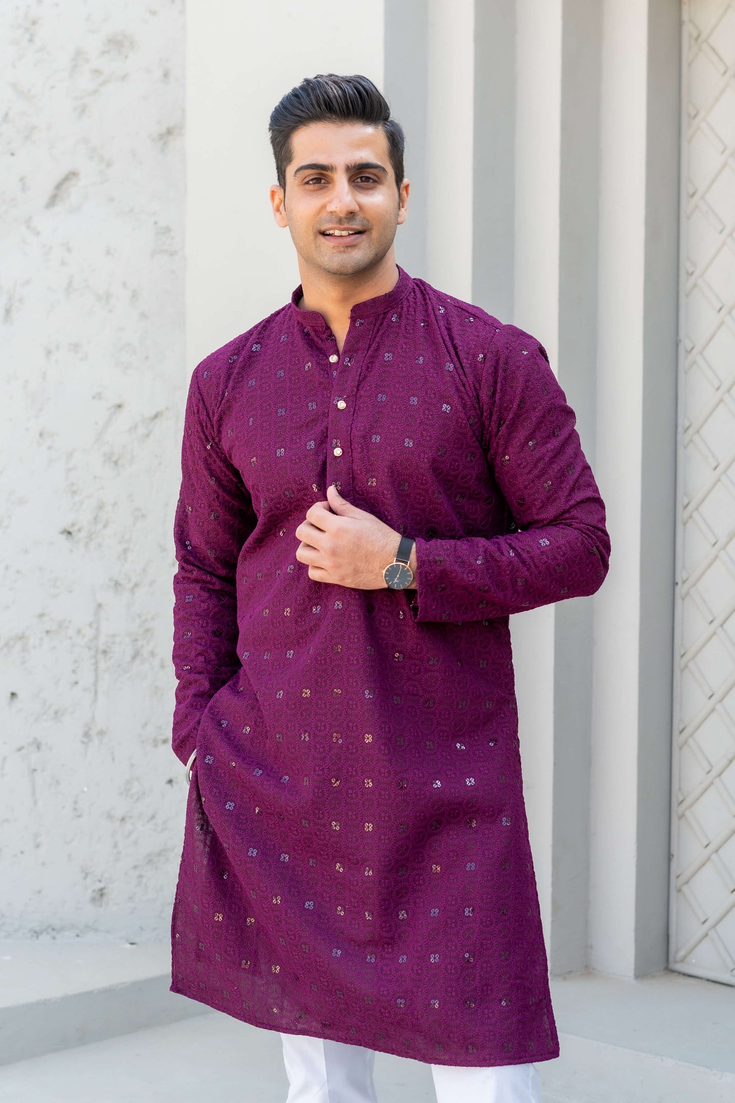 Indian man wearing wine color chikan kari kurta