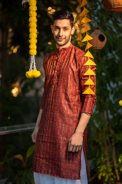 The Rusty Red Long Kurta With Zari Work And Tribal Print