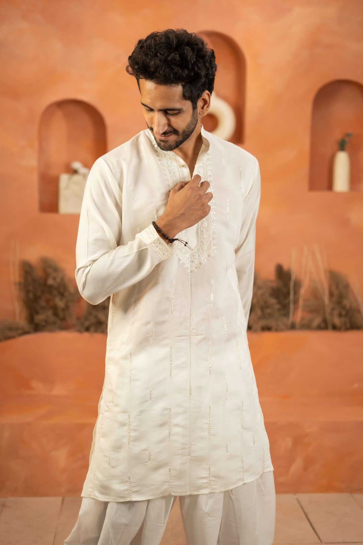 The White Long Kurta with Classic Embroidery and Sequins Work