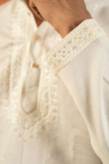 The White Long Kurta with Classic Embroidery and Sequins Work