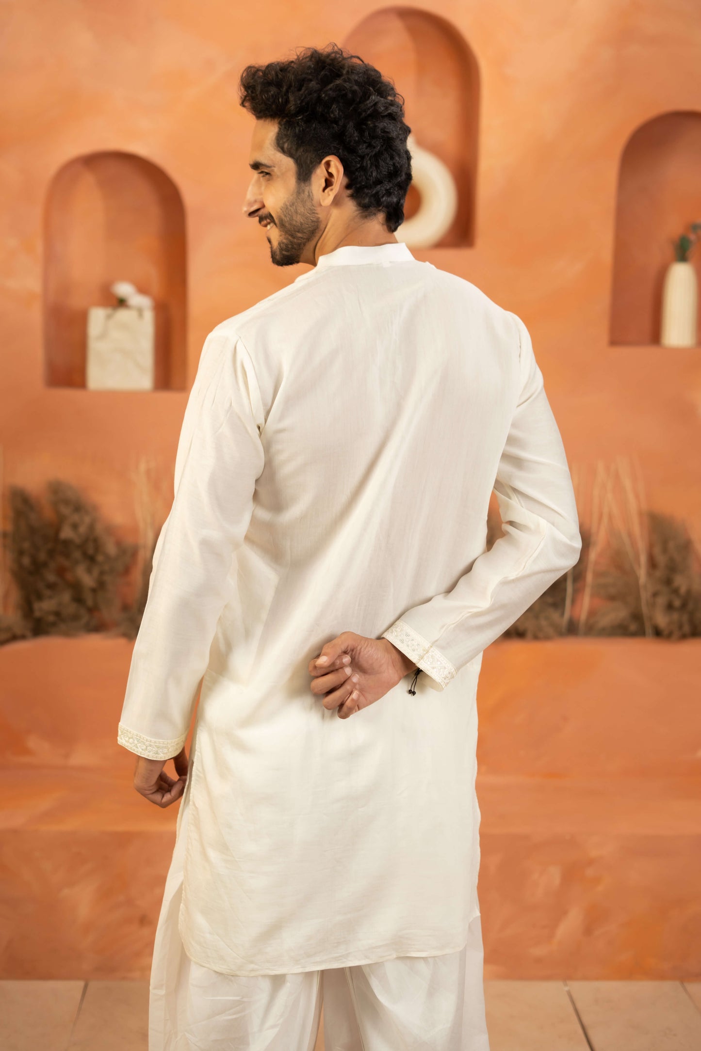 The White Long Kurta with Classic Embroidery and Sequins Work