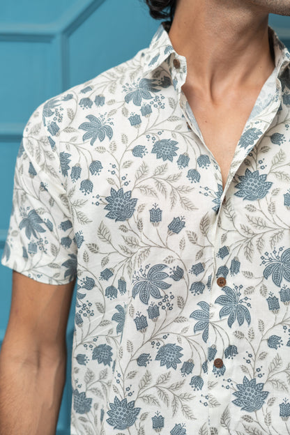 The White Half Sleeves Shirt With All-Over Floral Print