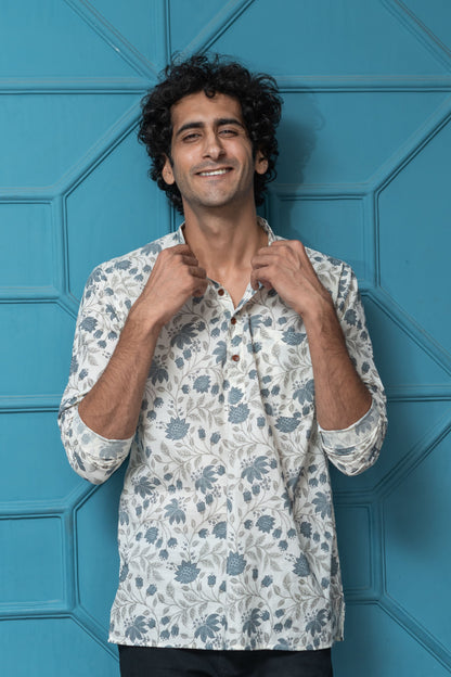 The White Short Kurta With All-Over Floral Print