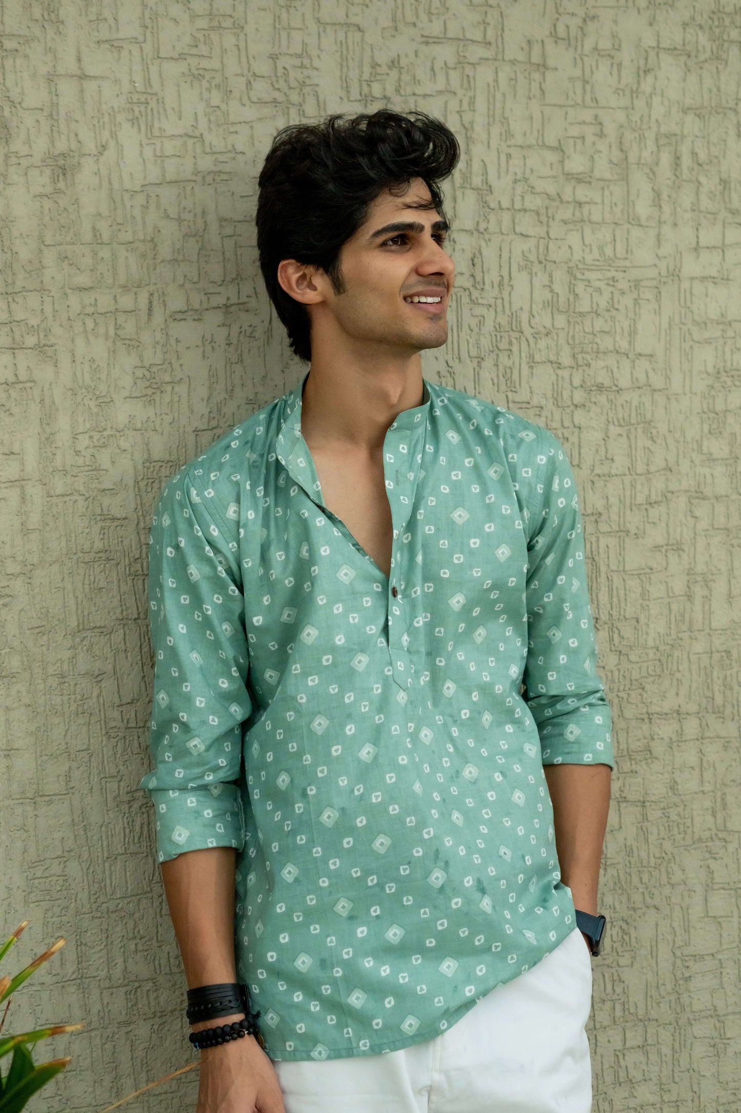 The Aquamarine Color Short Kurta With Geometric Print.