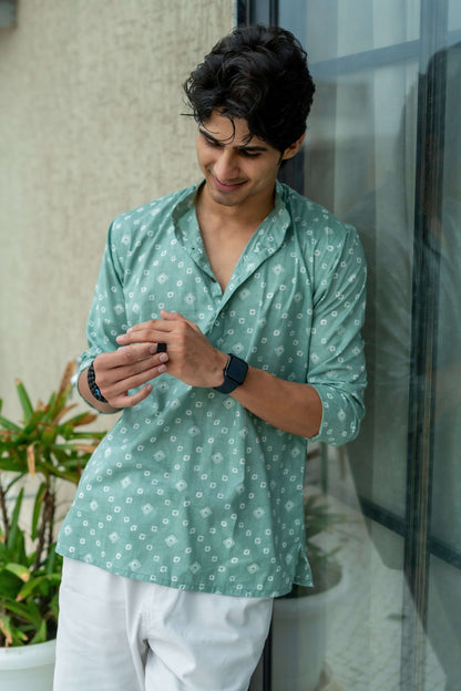 The Aquamarine Color Short Kurta With Geometric Print.