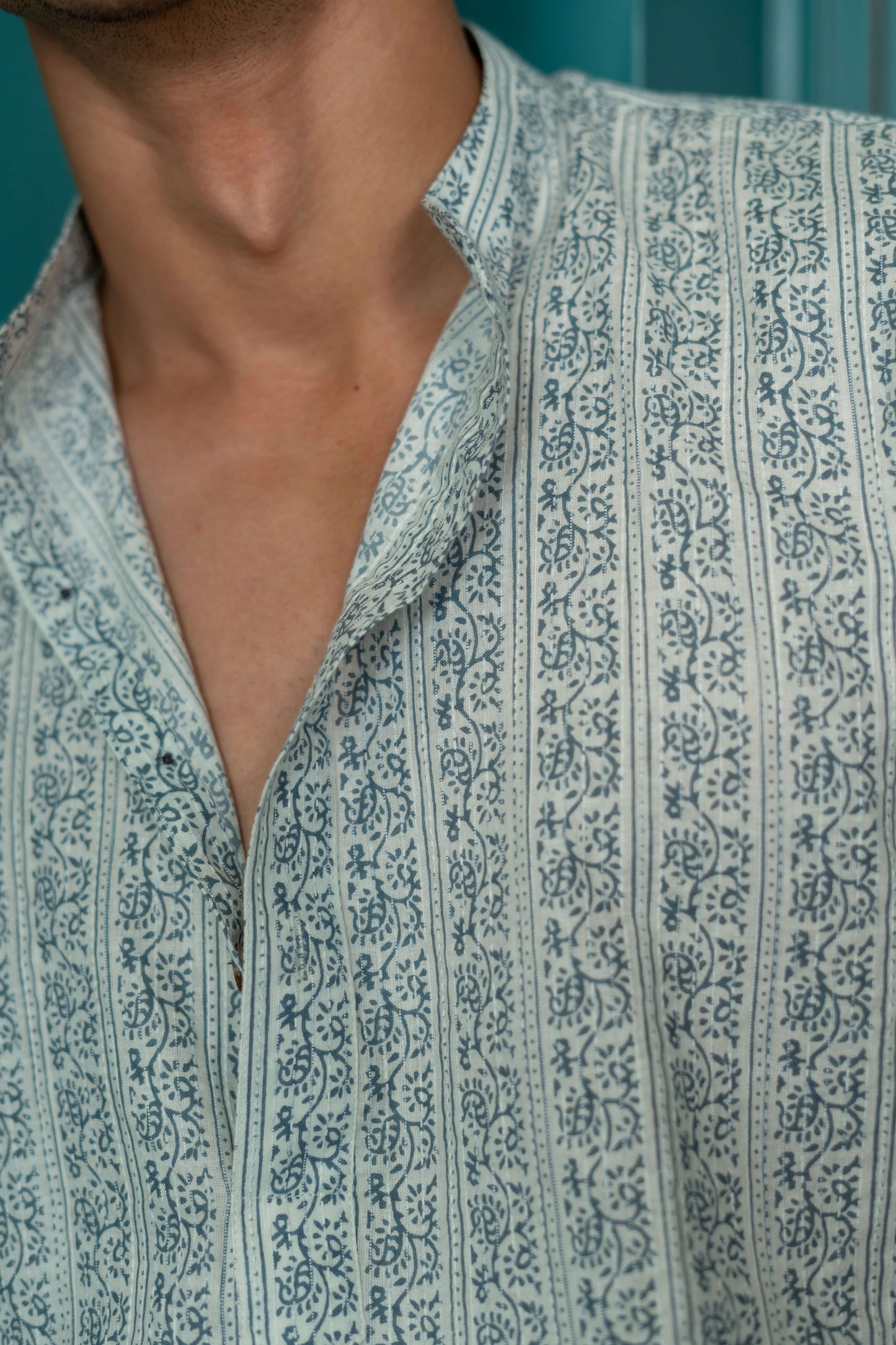 The Ivory Color Kantha Work Short Kurta With Teal Floral Stripe Print