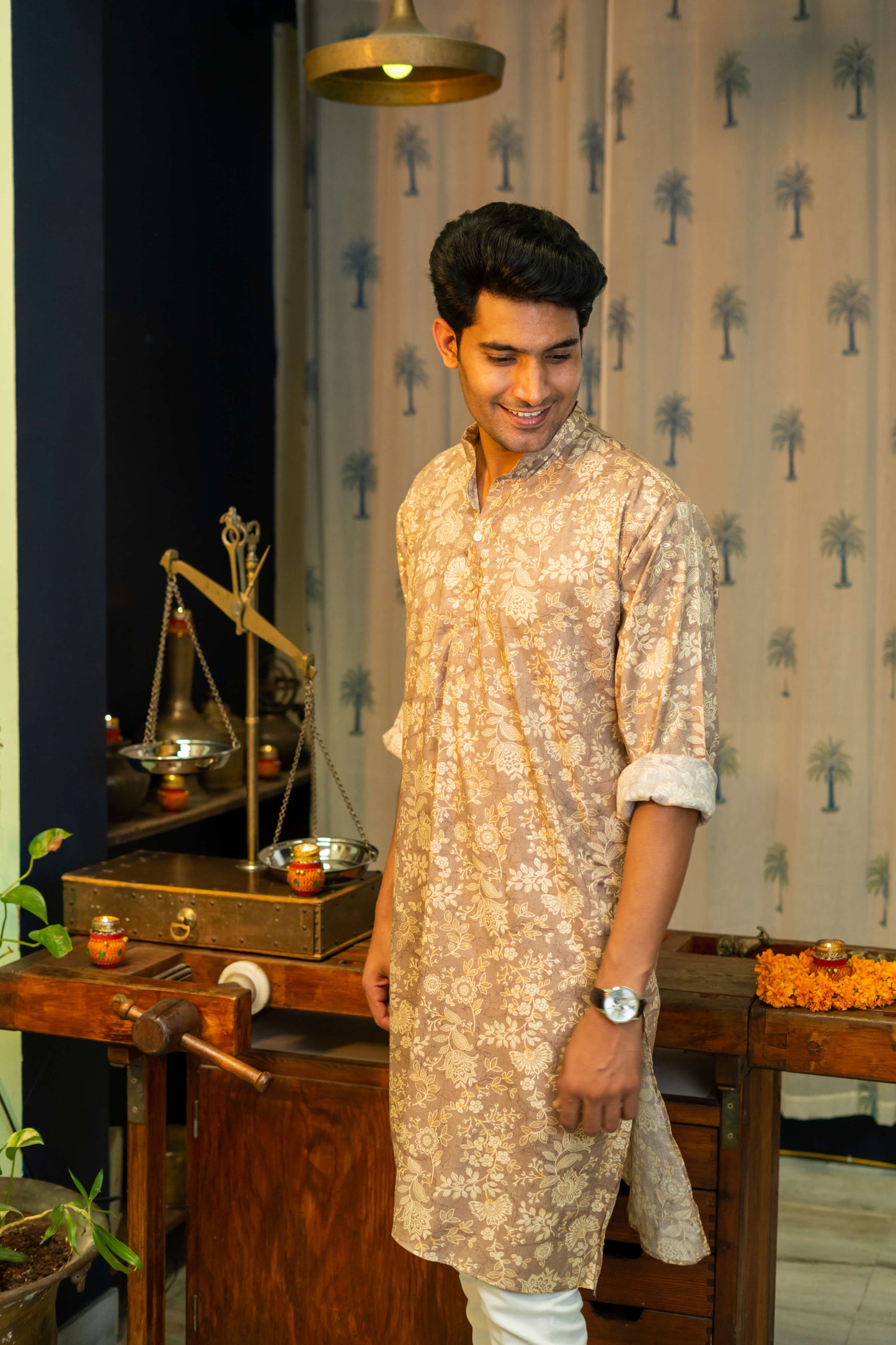 Man Giving Pose for  the Muslin Slub Long Kurta in Light Brown and Off-White Floral Print