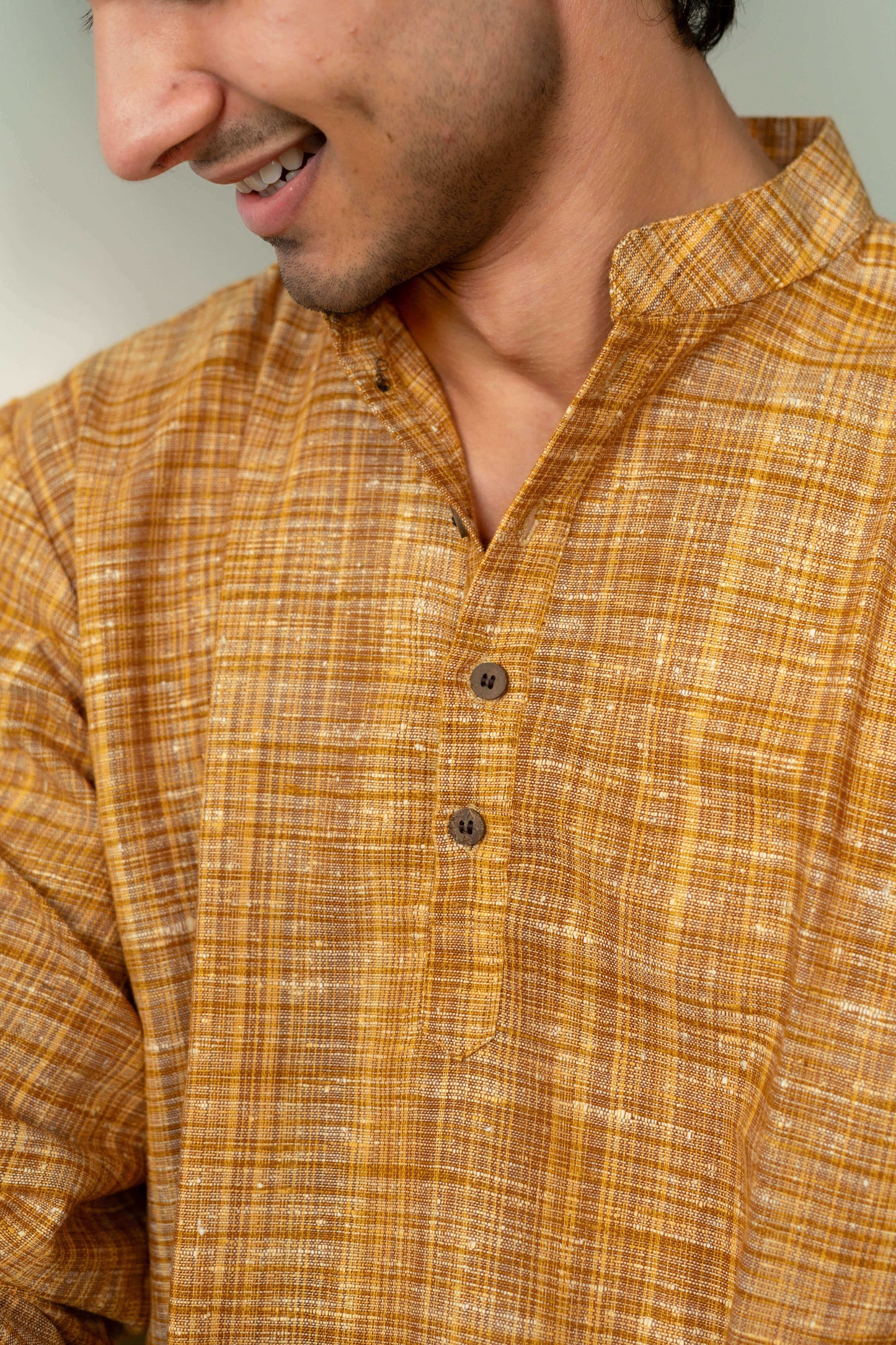 The Khadi Short Kurta in Yellowish Orange and Light Brown Color