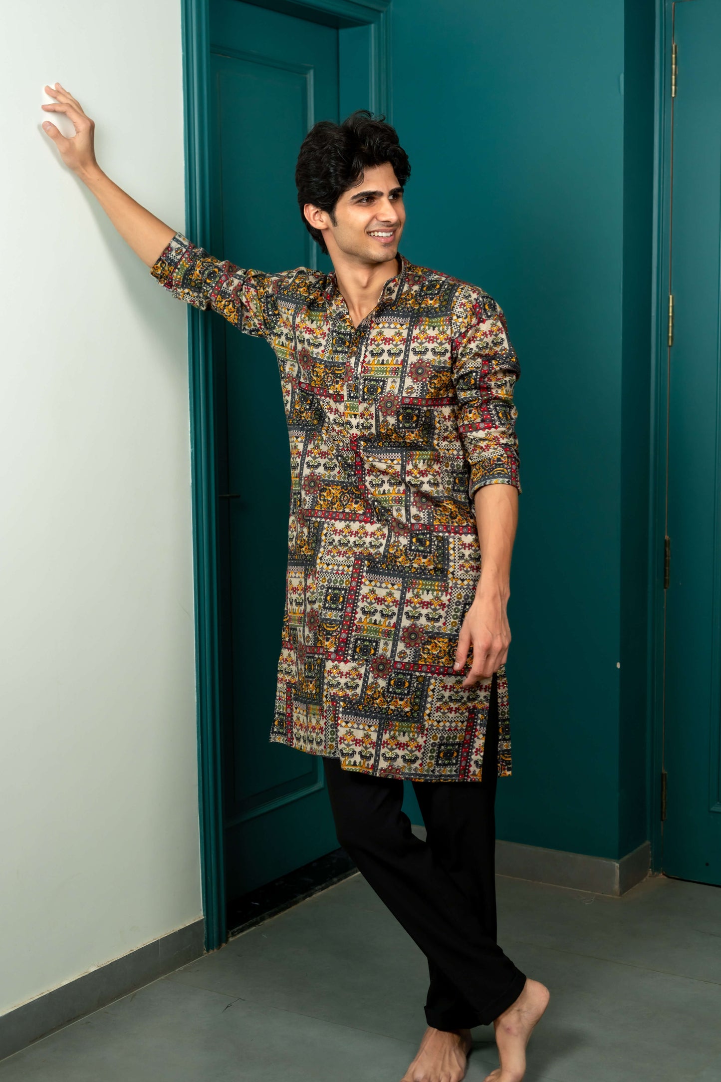 The Beige Color Long Kurta With Tribal Patchwork Foil Print