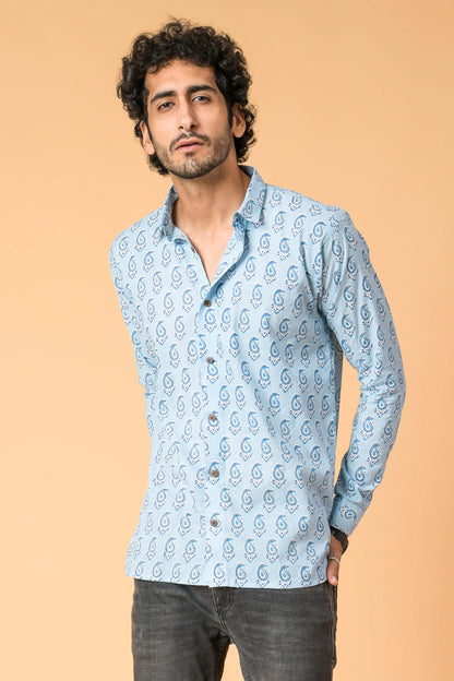 Indian man wearing light blue shirt